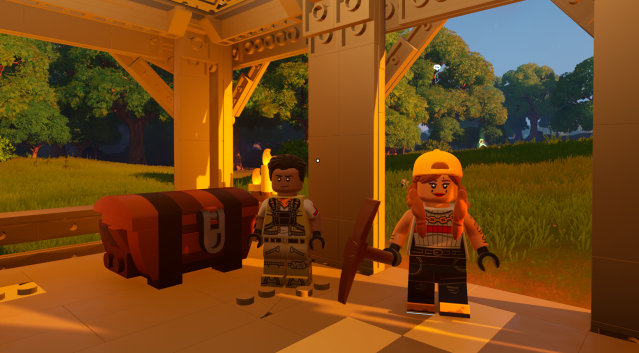 El personaje del jugador y Aura en LEGO Fortnite.